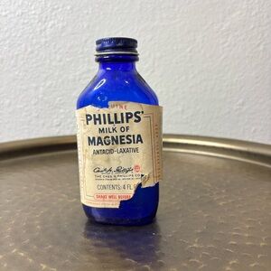 Vintage Phillips’ Milk of Magnesium blue glass with lid
